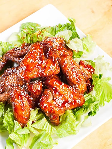 Alitas de pollo adobadas guatemaltecas - Foto kiwilimón