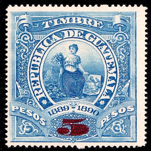 Descripción de la foto - primer timbre de Guatemala en impresión azul una mujer ilustrada con flores, el escudo nacional y el año 1889-1890 crédito de la foto - Del Valle Dental
